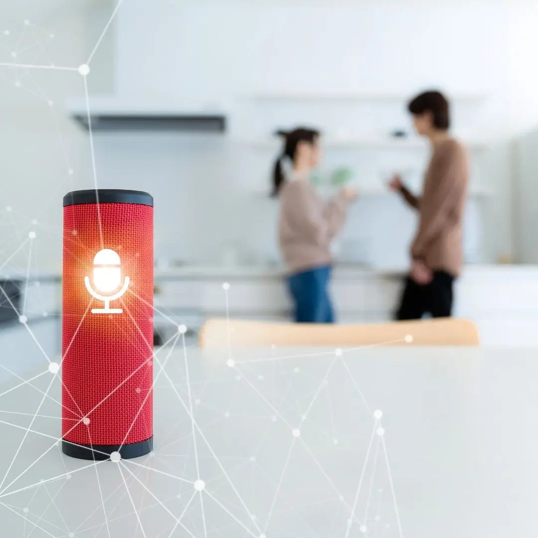 Photo of a smart speaker lighting up to listen to voice prompts.
