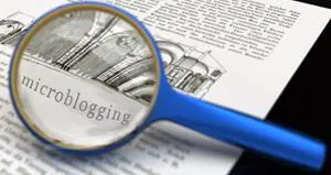 An image of a magnifying glass over the word microblogging.